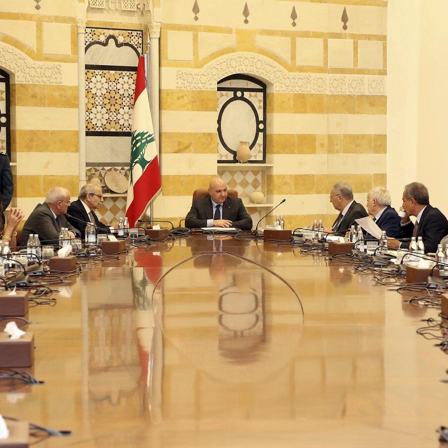 Lebanese Shiite ministers walk out of a Cabinet meeting over plan to disarm Hezbollah